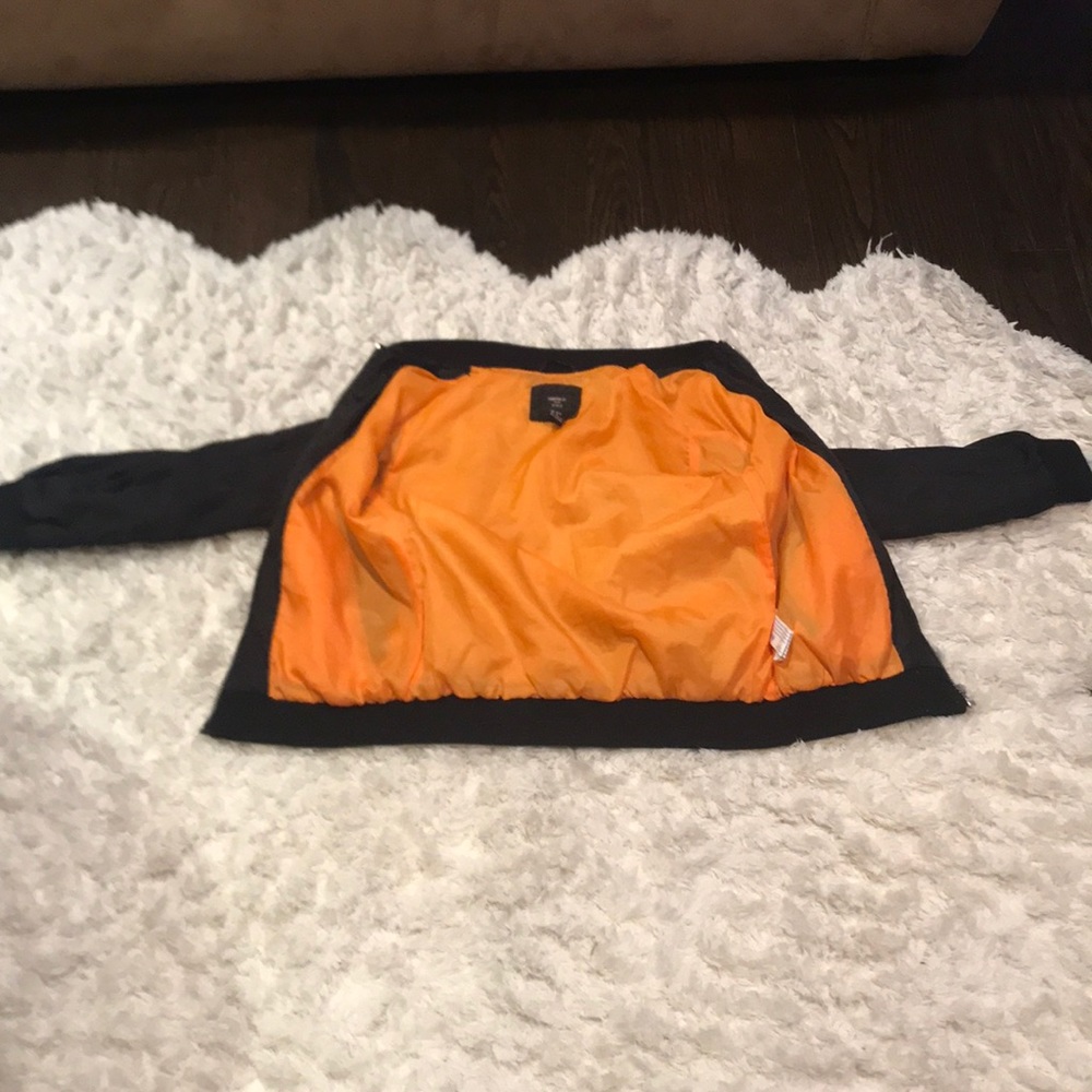 Black/ orange girls bomber jacket.      Size: 9/10